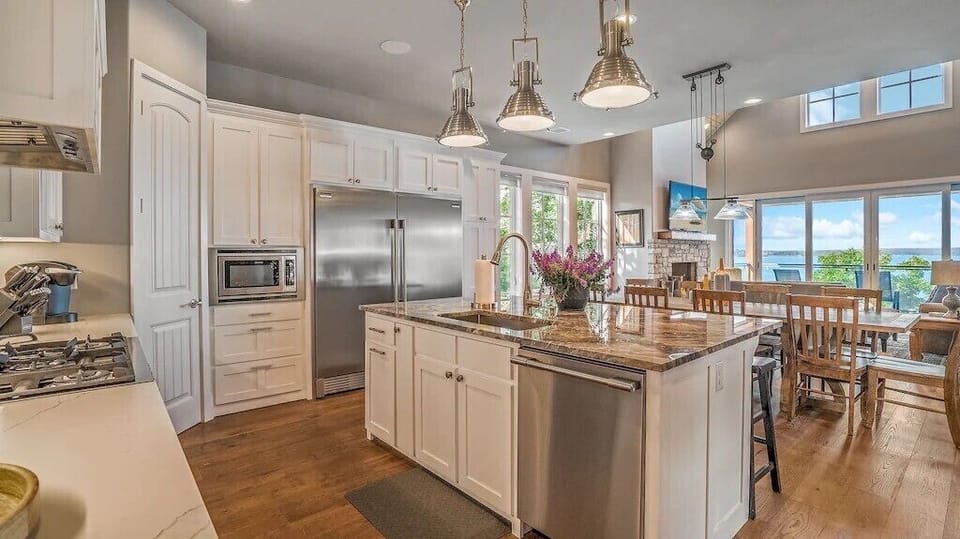Massive kitchen off the living room makes sure that everyone is in on the action!