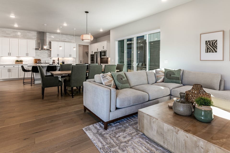 A great room concept with the Kitchen, Dining and Living Rooms all together
