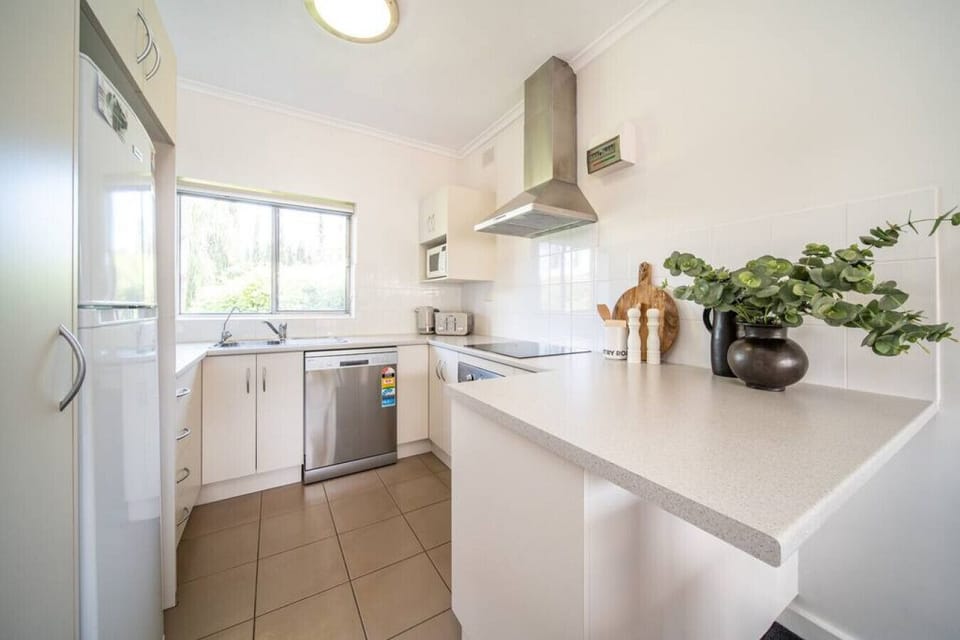 Whip up your favourites in this bright and breezy kitchen, fully equipped and designed with both form and function in mind.
