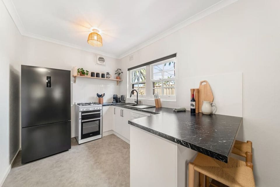 Start your morning at the breakfast bar with a coffee in hand, perfect for quick bites or casual conversation.