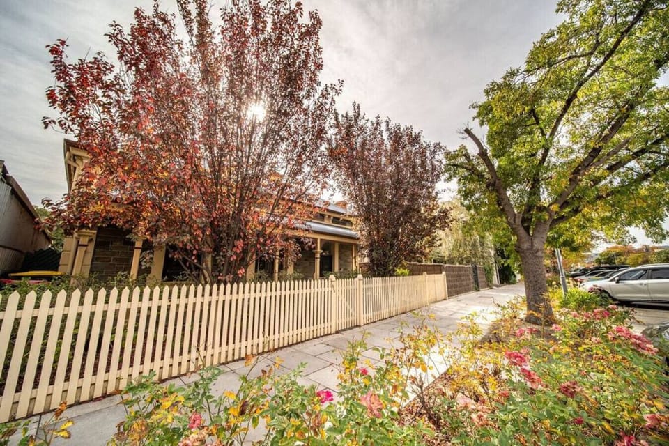 Take in the picket fence and blooming surrounds that enhance the home’s street appeal.