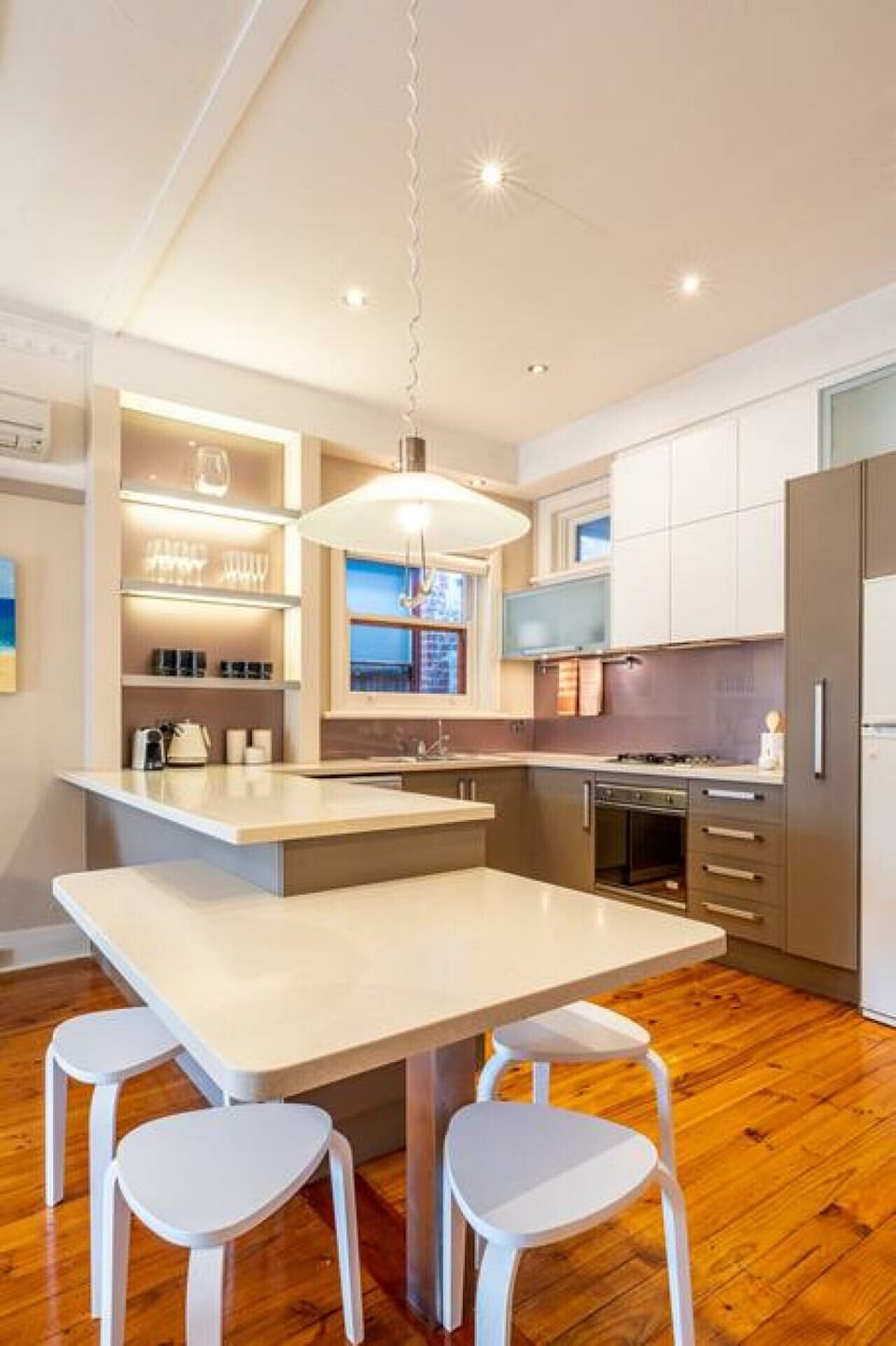 Cook at your own pace in the well-sized kitchen, offering ample bench space and a practical layout for everyday meals.