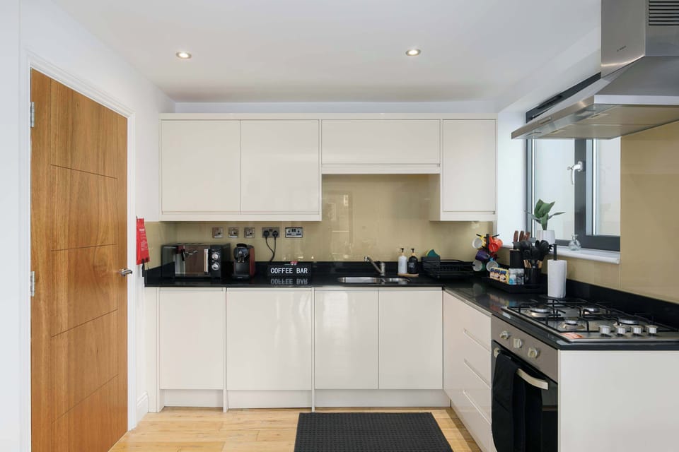 Cook in style in this contemporary kitchen, or enjoy your morning coffee on the balcony. Includes washing machine, microwave, fridge-freezer, oven, toaster, kettle and coffee machine.