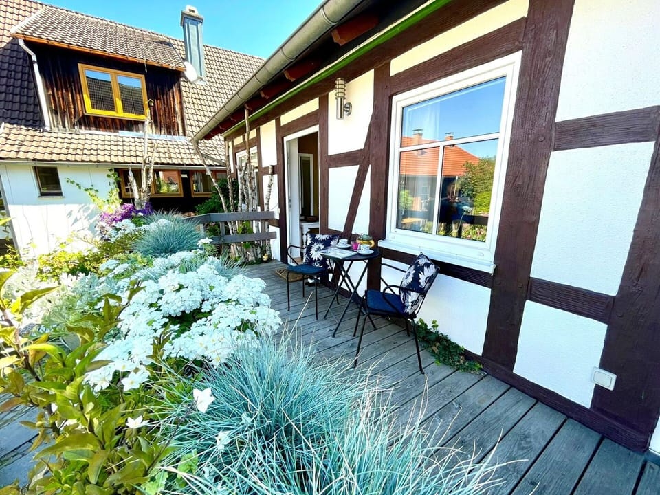 Flooring, Floor, Interior Design, Ceiling, Door, Stairs, Molding, Wood Stain, Handrail, Hardwood