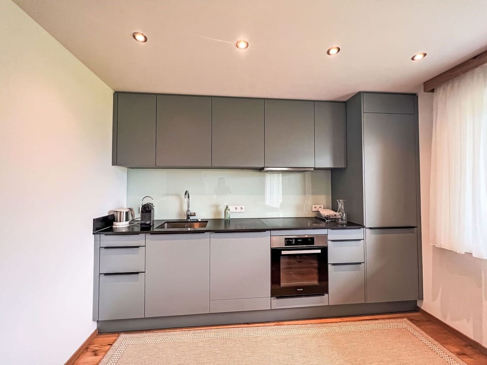 Kitchen, Kitchen Appliance, Countertop, Cabinetry, Interior Design, Major Appliance, Furniture, Flooring, Wood, Home Appliance