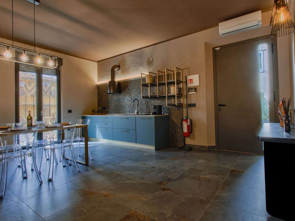 Flooring, Furniture, Interior Design, Wall, Floor, Wood, Ceiling, Light Fixture, Lighting, Countertop