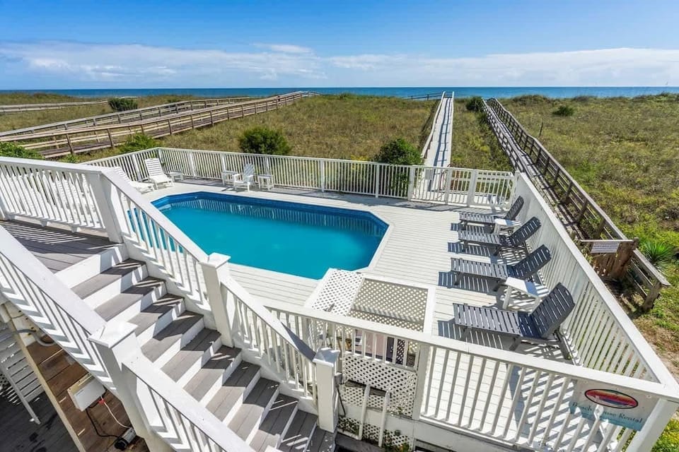 Shared Pool w plentiful seating and picnic table