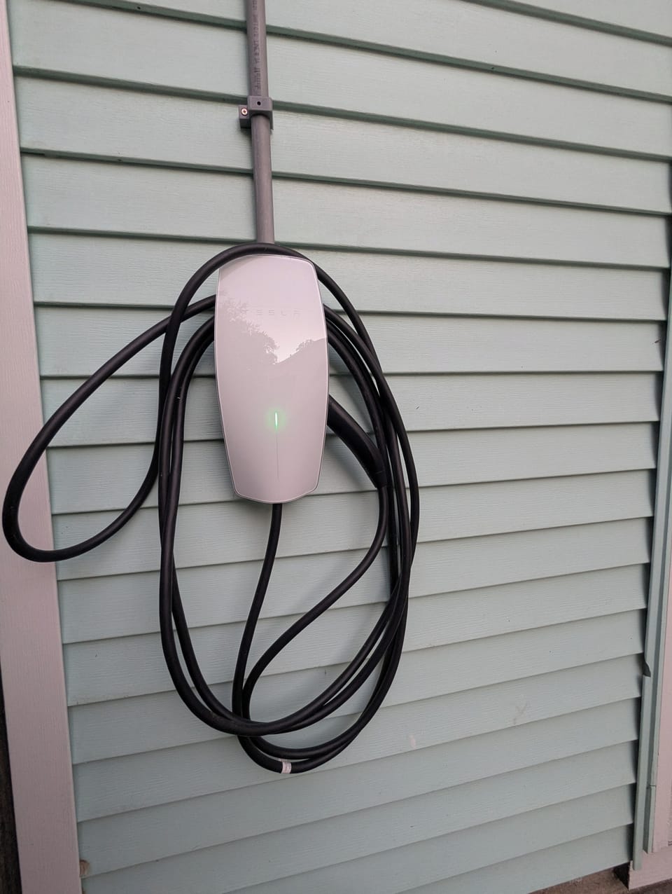 Free driveway parking for multiple vehicles, plus a convenient EV charger for electric vehicles.