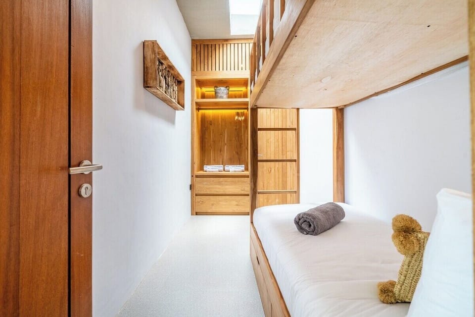 Sturdy bunk beds with comfy mattresses. #Villa Samalas