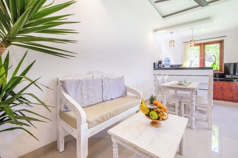 Unwind in the peaceful charm of Villa Sinabung. The stylish, cozy living room is perfect for hanging out with friends or enjoying stay night in. #Villa Sinabung