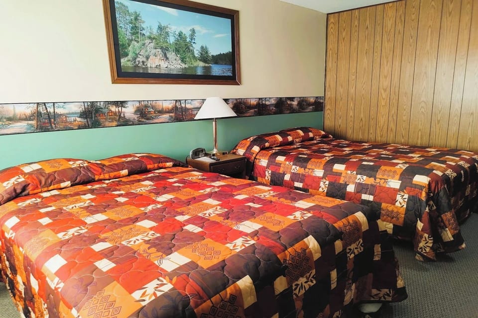 Spread out across two comfy beds after a full day.