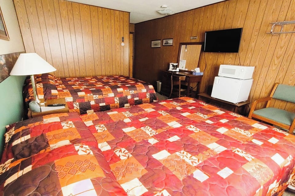 Lounge comfortably with easy access to desk and in-room TV.