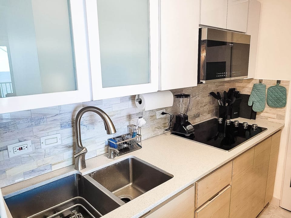 Kitchen with Microwave , Convection Oven and Cooktop