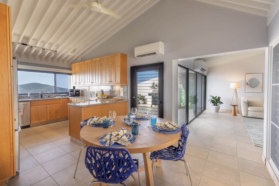 Kitchen And Dining Open Up To The Living Area And Deck