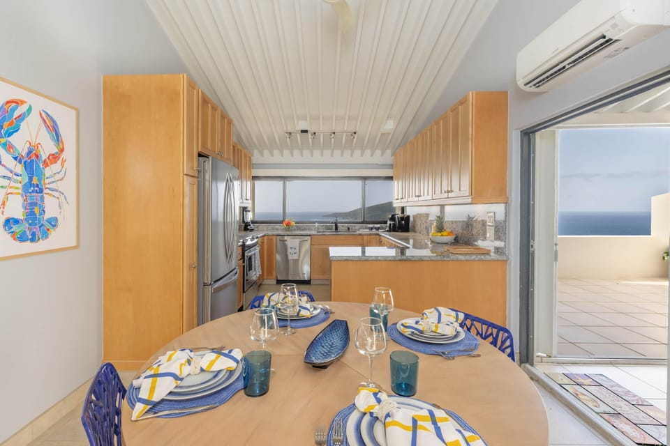 Large Kitchen And Open Dining Area