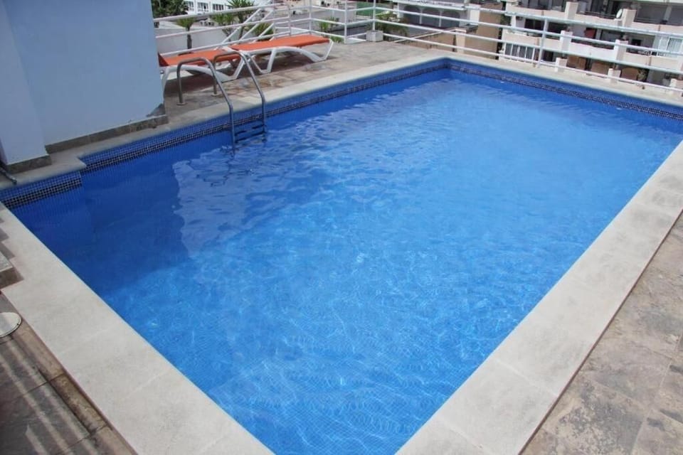 Cool off in the crisp pool with easy ladder access.