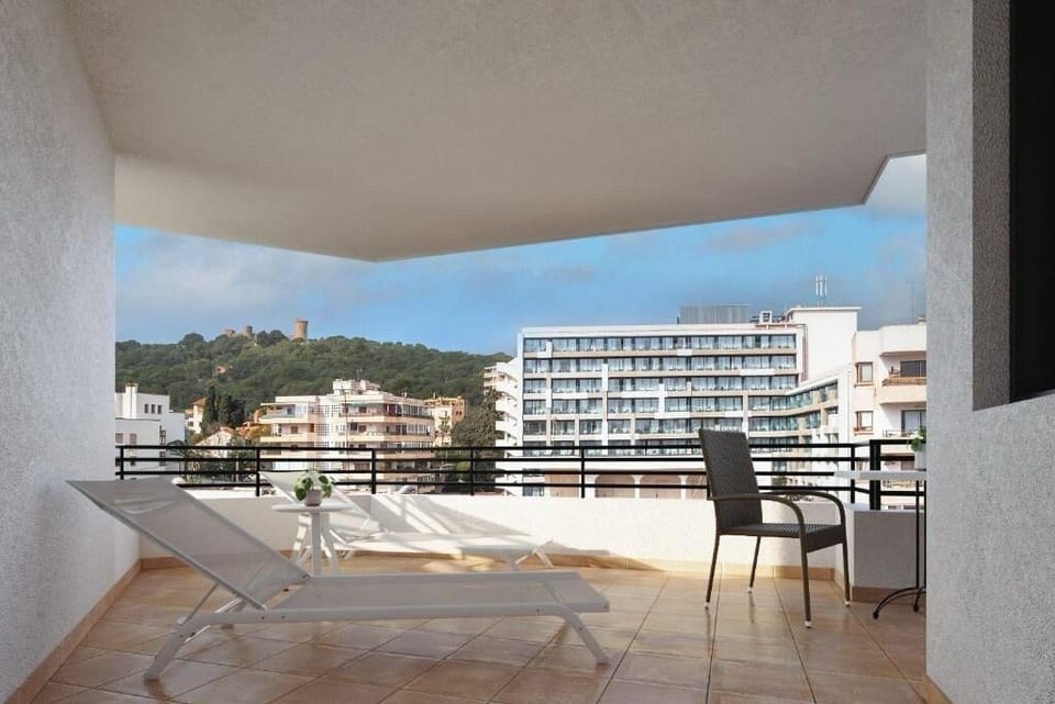 Lounge privately on the terrace with open-sky serenity.