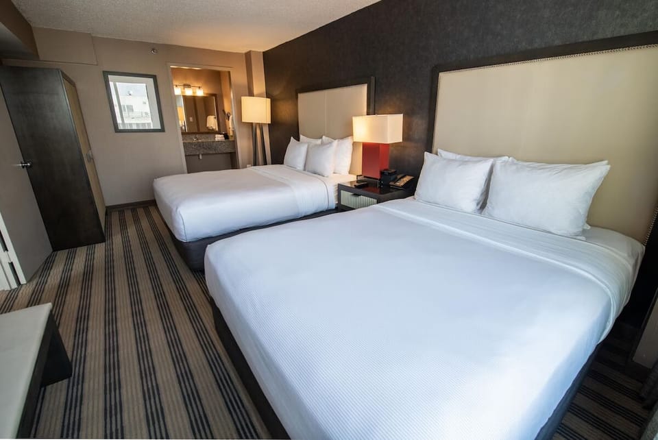 Settle into crisp linens and unwind in this double-queen room.