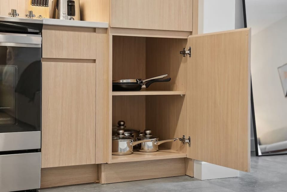 Start mornings with coffee in a clean, modern kitchen.