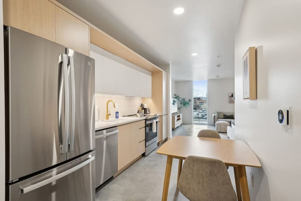Prep and serve easily with sleek sink and dishwasher.