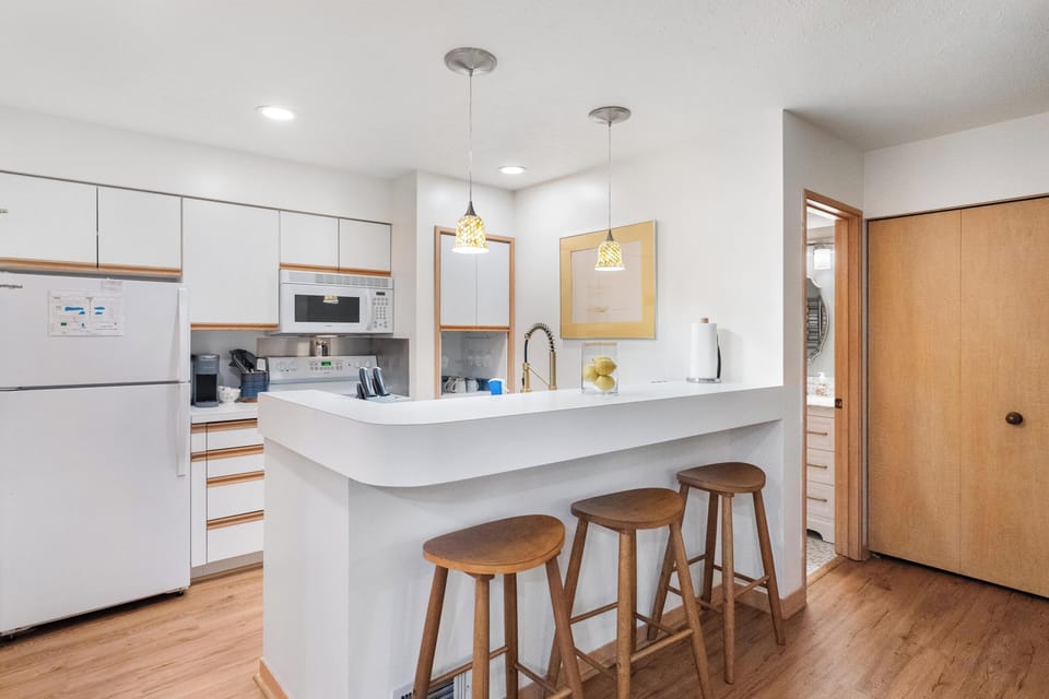 Kitchen with seating for 3 at bar