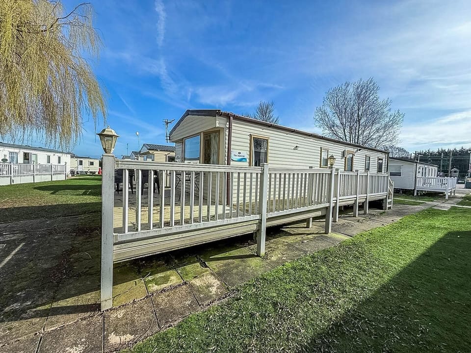 Enjoy sunny weekends at this beautiful caravan on Southview Holiday Park with its decking and pond view