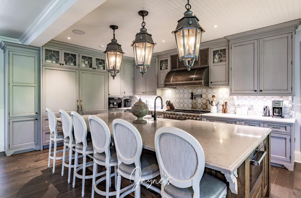 Elegant kitchen with spacious island and classic lantern lighting