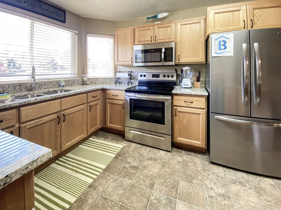 Modern appliances and generous counters for effortless meal preparation