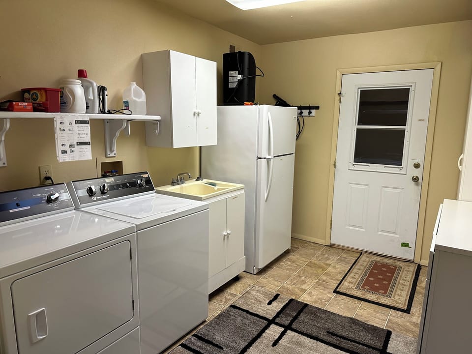 Laundry room with extra frig
