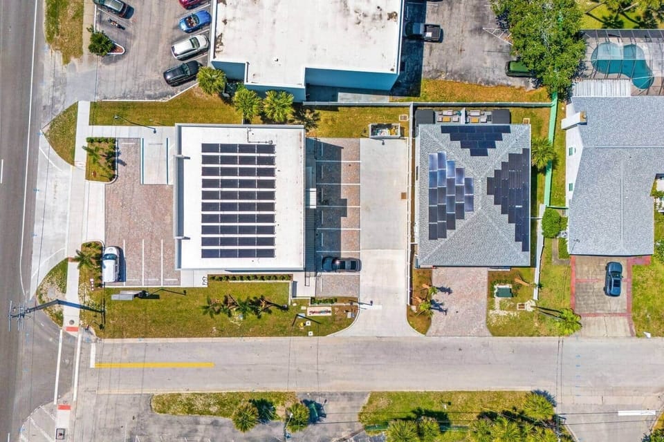 Aerial view of building and neighbourhood.