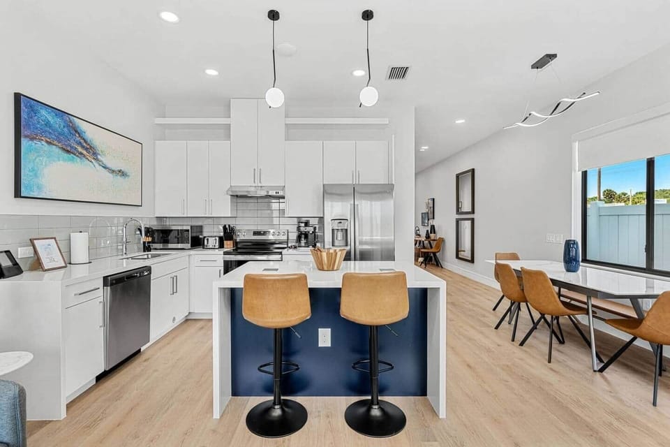 Create culinary delights in this stylish kitchen with a spacious island for meal prep.