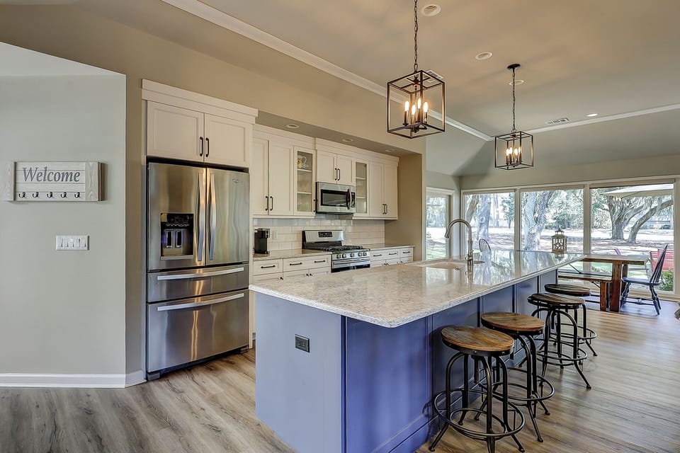 Fully stocked kitchen featuring all stainless steel appliances