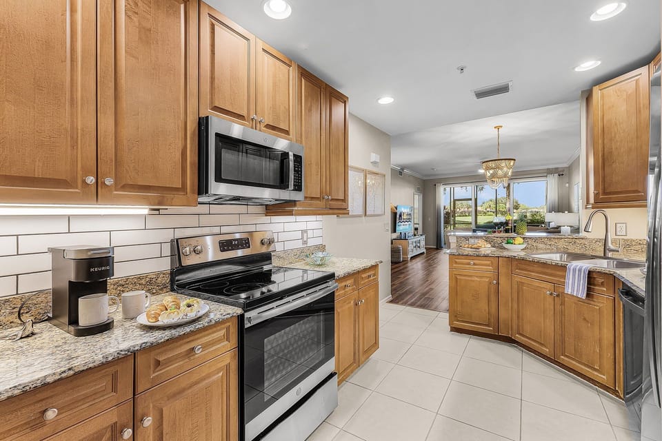 Kitchen with direct access to garage.