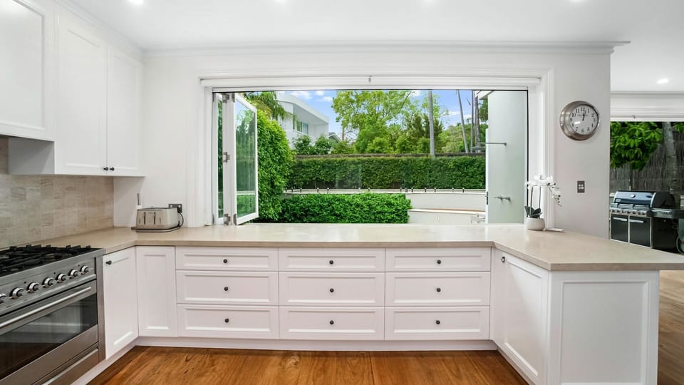 Light-filled kitchen with garden views and ample bench space