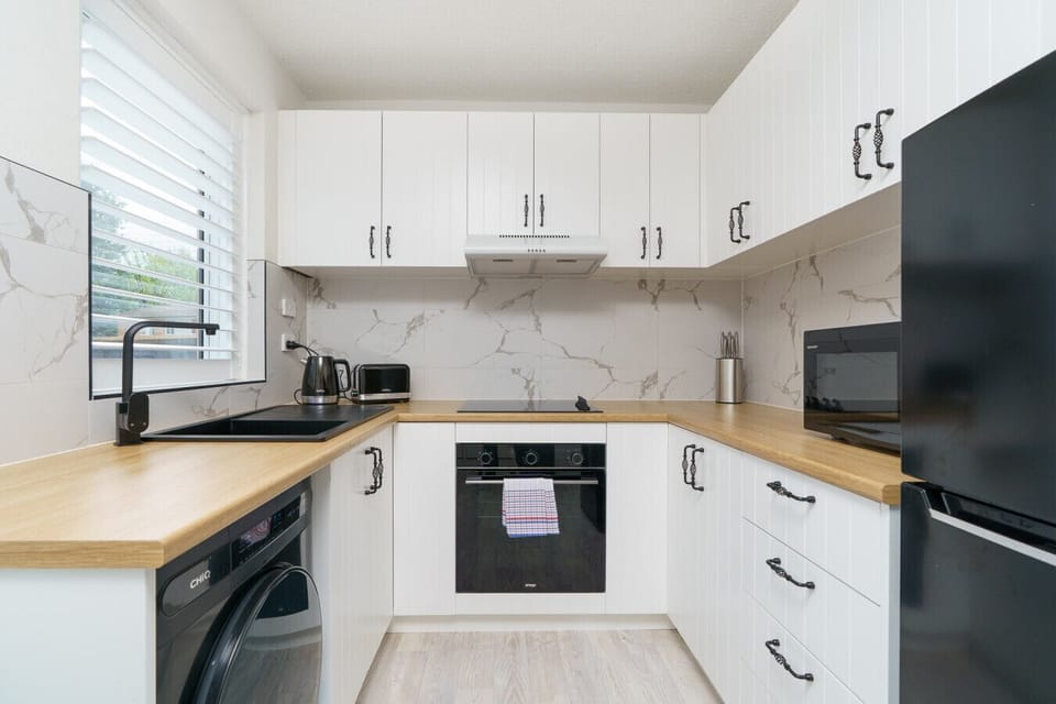 Fresh, modern kitchen perfect for home-cooked meals or casual breakfasts