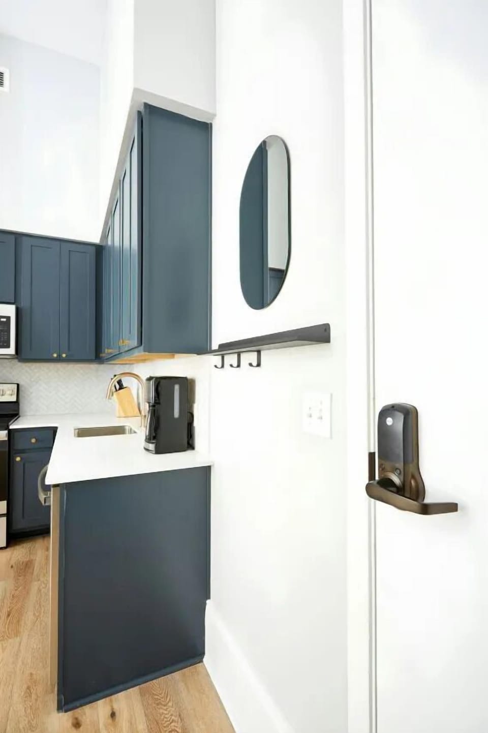 Fully equipped kitchen area with ample counter space.