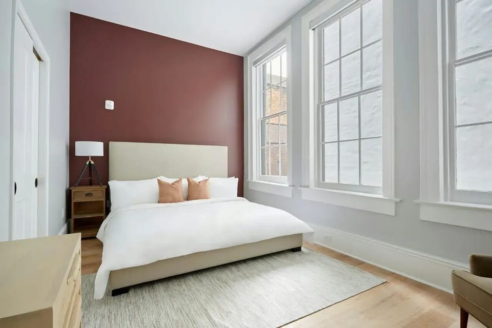 Bedroom 2 features a queen bed.