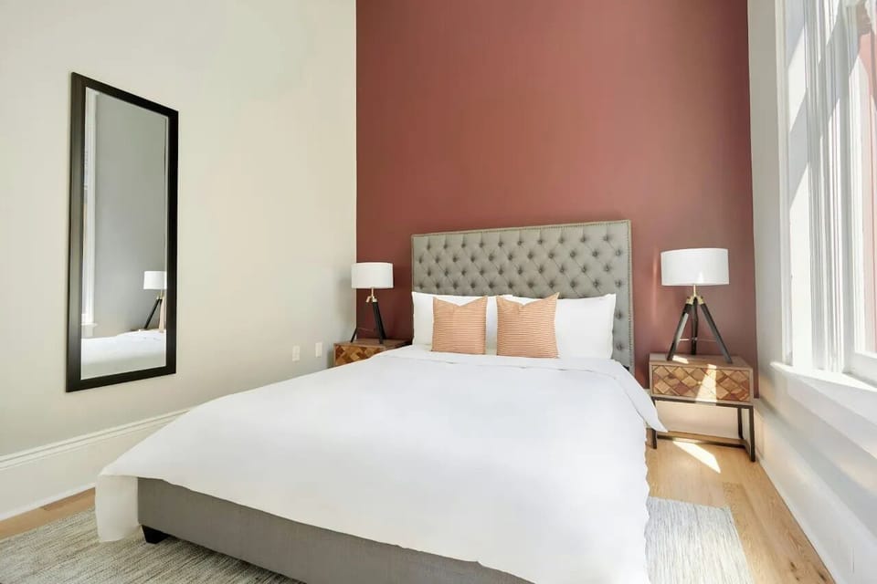 Bedroom 1 features a queen bed.