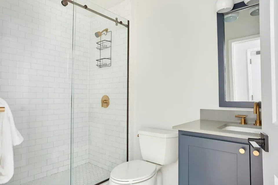Full bathroom features a shower.