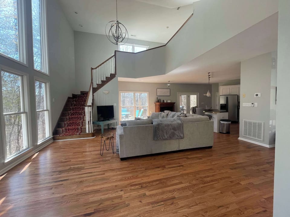 Large Living Open Living Room I Staircase to Master Loft