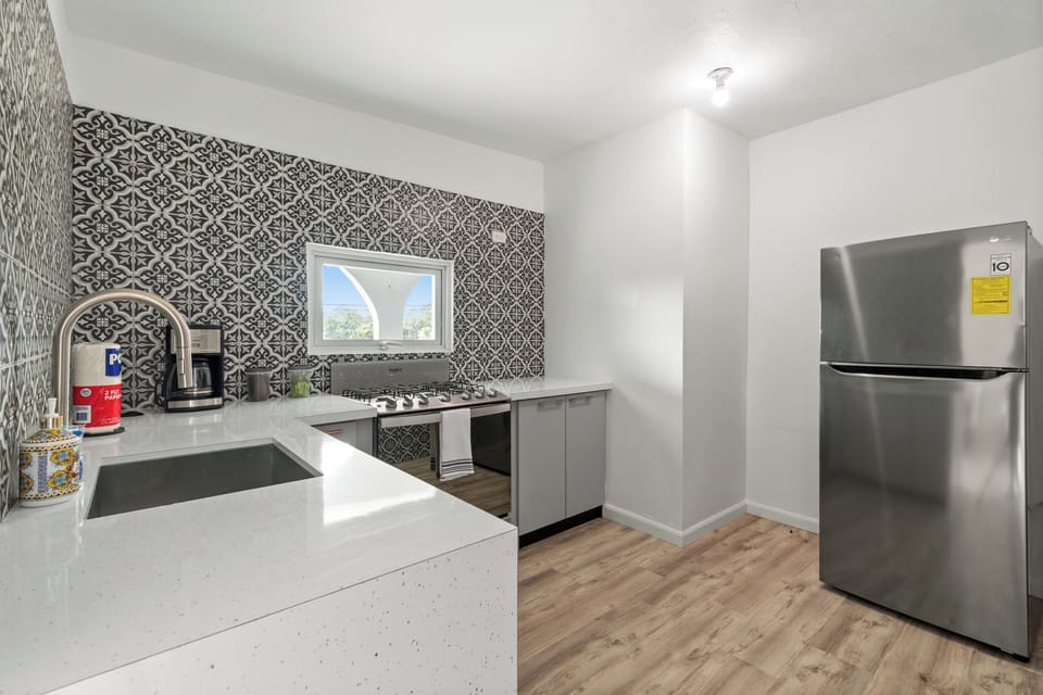 A well-designed kitchen, perfect for preparing meals during your stay.

