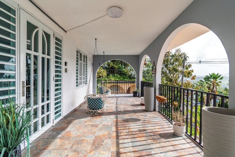 Enjoy the fresh air on your spacious patio with a swing chair.