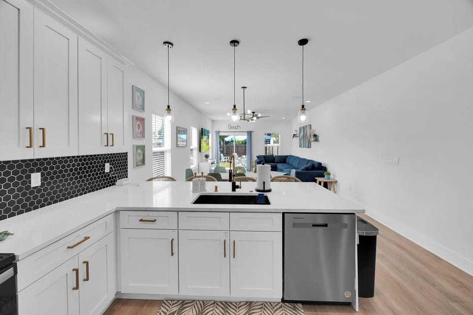 Kitchen - chef-ready kitchen stocked with everything you need: cookware, utensils, small appliances, coffee bar and bar seating for 4.