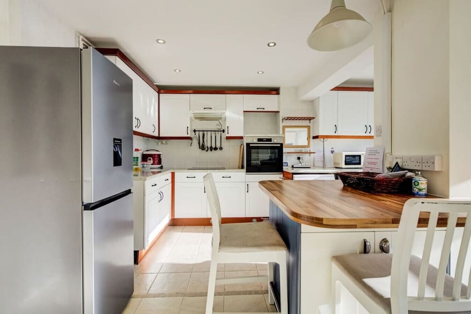Bright dining area next to kitchen
