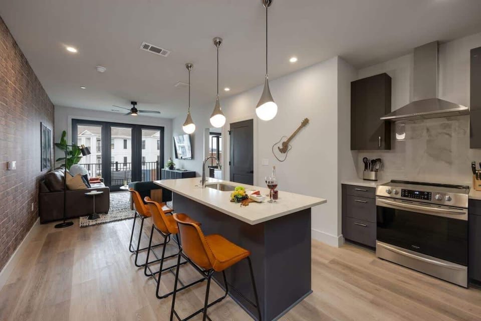 Your new space for entertaining and relaxing. Enjoy the bright, open floor plan from kitchen to living area.