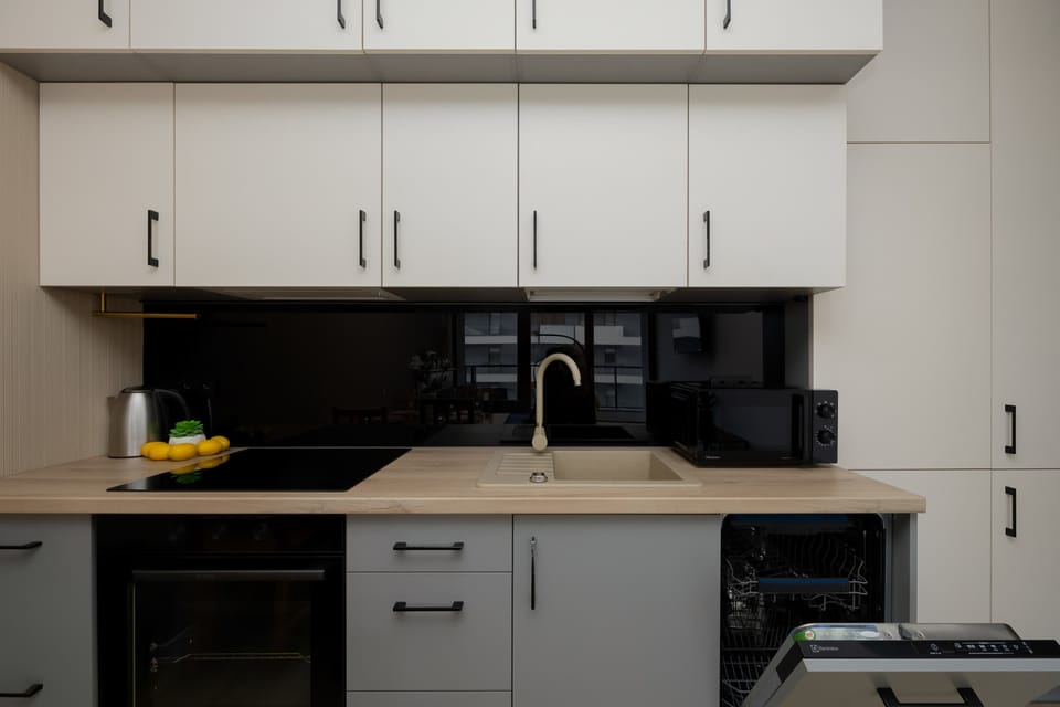 Functional kitchen space perfect for home-cooked meals.