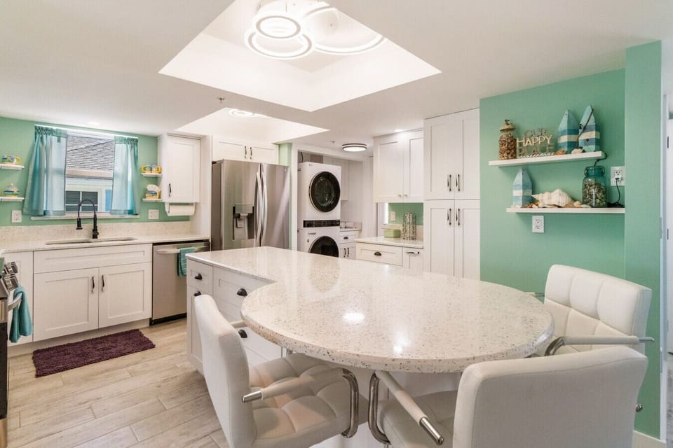 Cook, connect, and create memories — this bright coastal kitchen is the heart of The Phoenix 💛🍴
