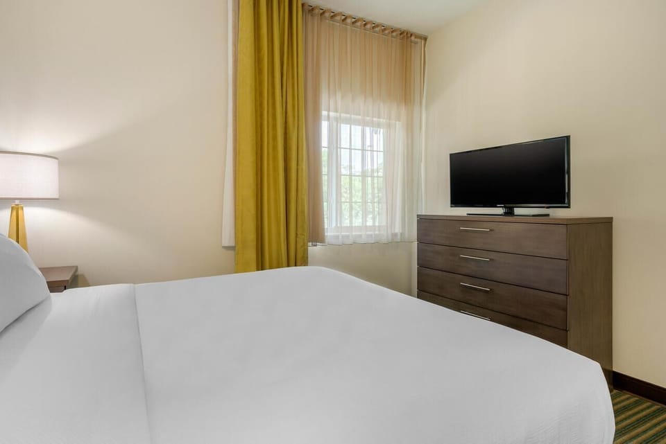 Unit with a comfy bed and flat screen TV