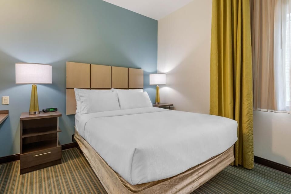 Happiness is curling up in a comfy bed after a long day!