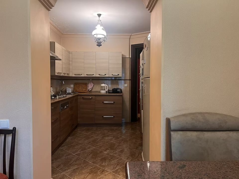 A large kitchen full of necessary equipment.